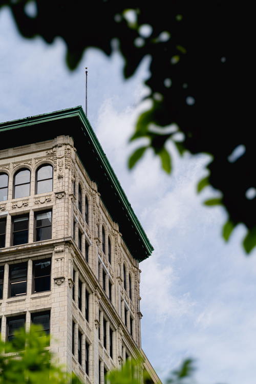 A clock-topped building located in NYC.