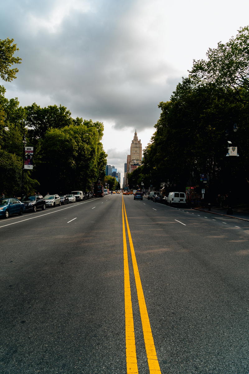A yellow line on a street in NYC.