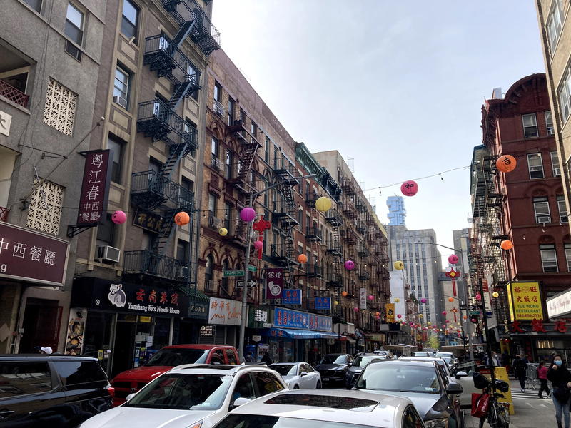 A street in NYC adorned with Chinese lanterns.