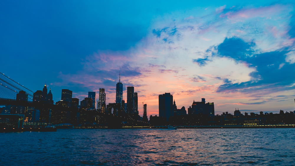 The sky above Brooklyn Heights is blue.