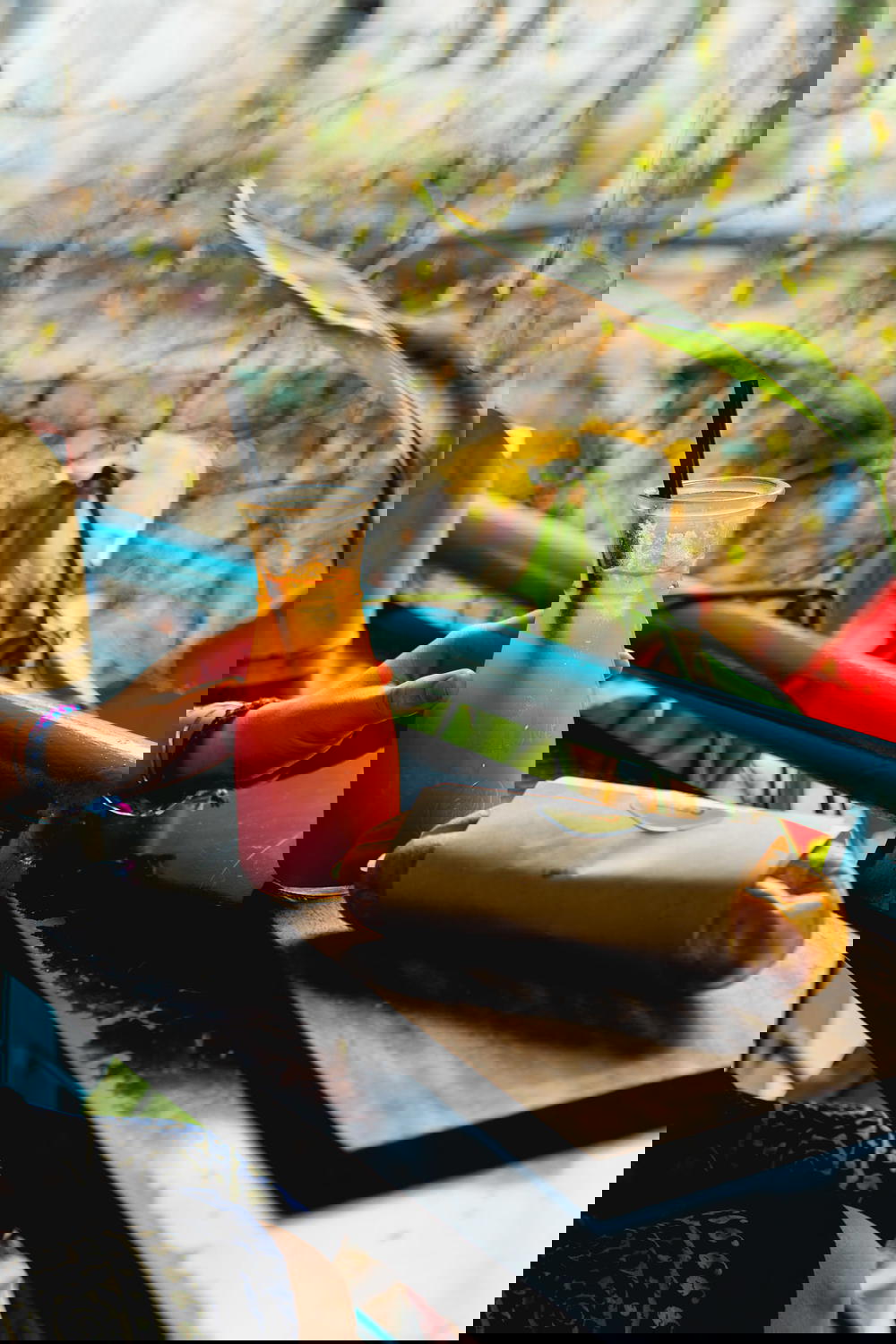 A woman enjoying a drink at a table in Hanoi, Vietnam.