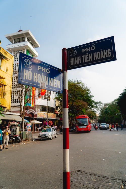 Street signs at Hoan Kiem Lake Hanoi Vietnam best places to see