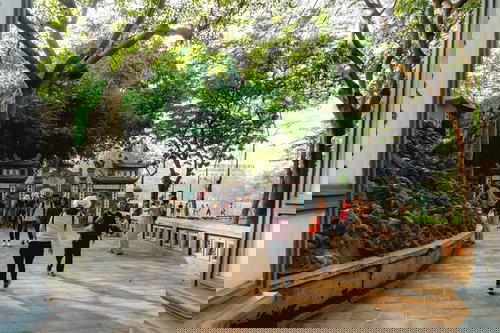 Walkway to the old temple at Hoan Kiem Lake Hanoi Vietnam