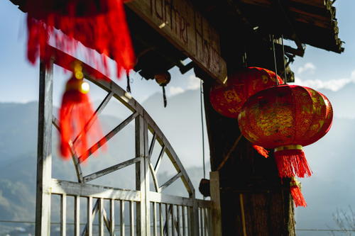 Chinese lanterns hanging from a fence in Vietnam's Sapa region.