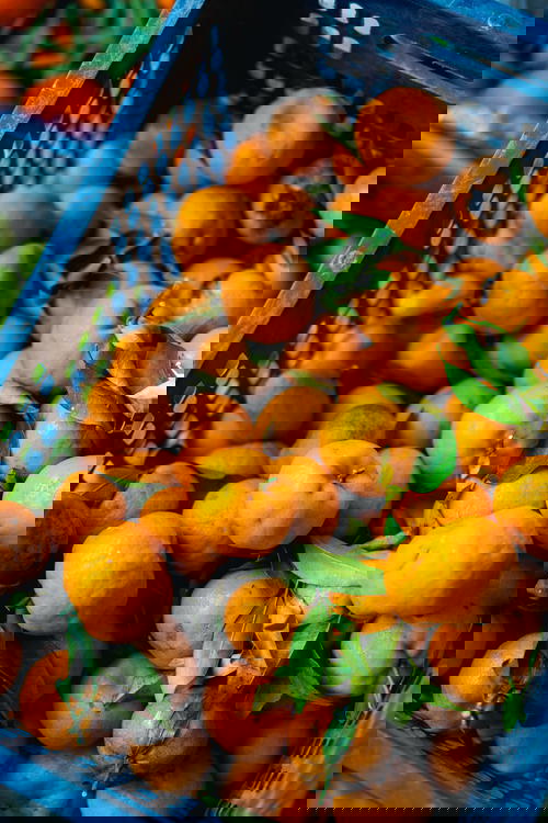 A basket of oranges in Sapa, Vietnam.